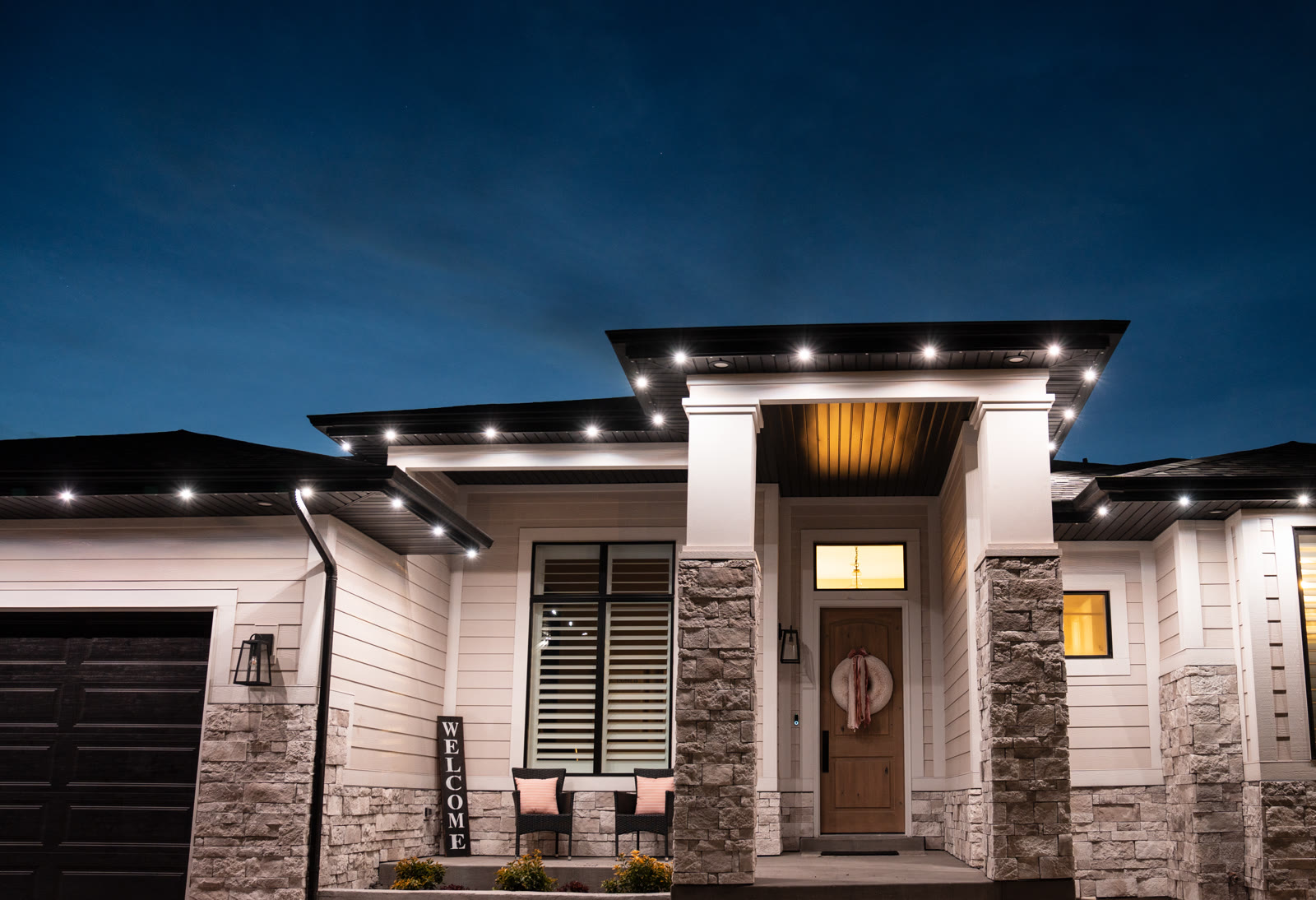 Permanent outdoor security lights on a Fresno residential home entrance